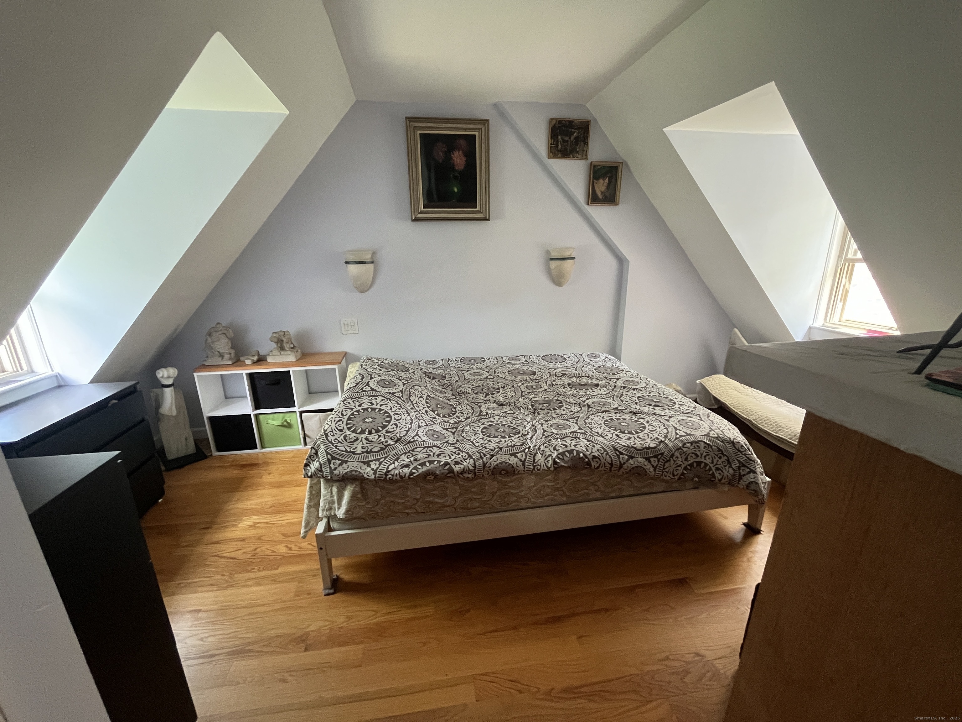 68 Cole Street Bridgeport, CT 06604 - Photo 17 of 31 a bedroom with a bed and a large window