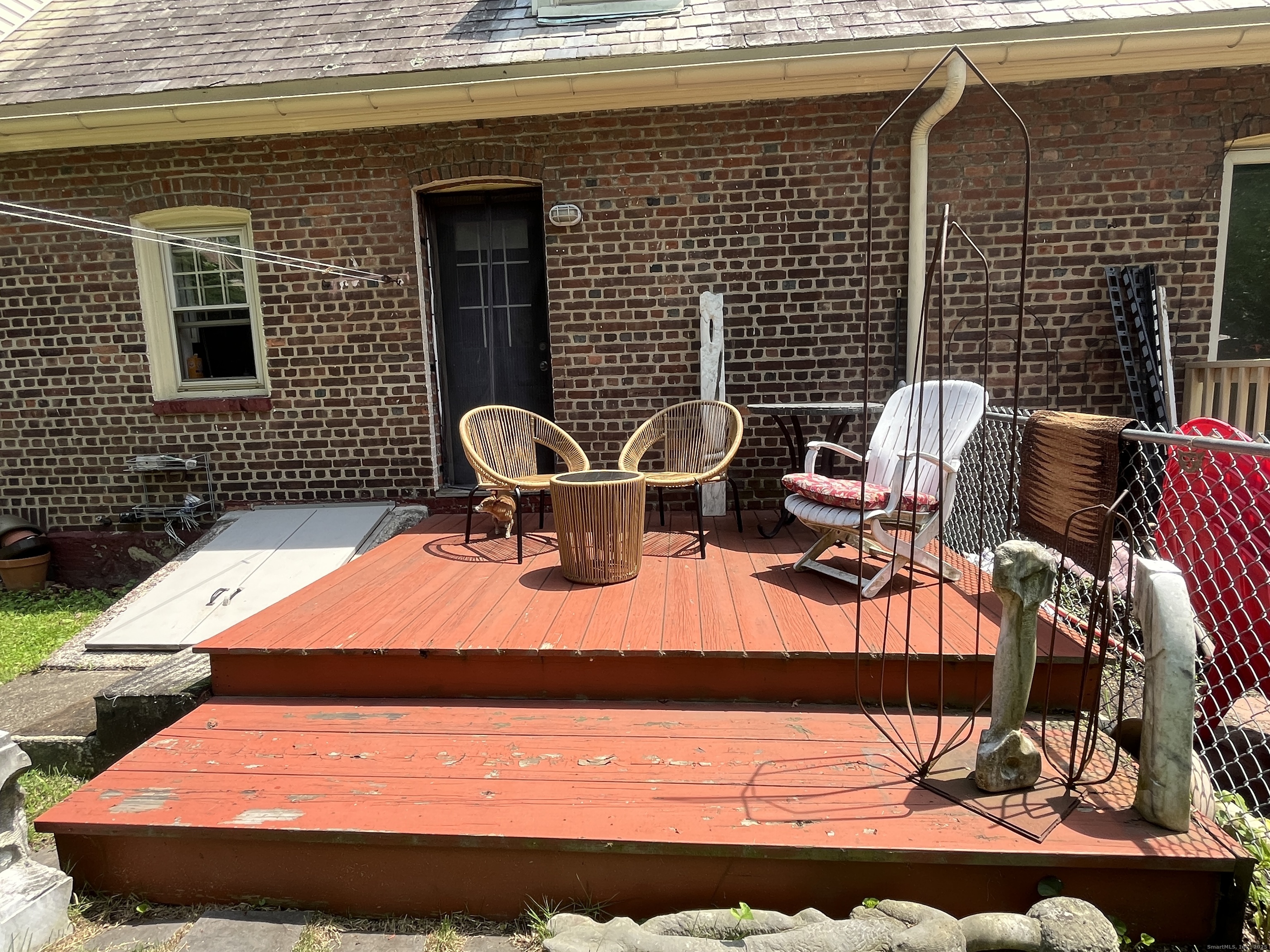 68 Cole Street Bridgeport, CT 06604 - Photo 19 of 31 a backyard of a house with seating space