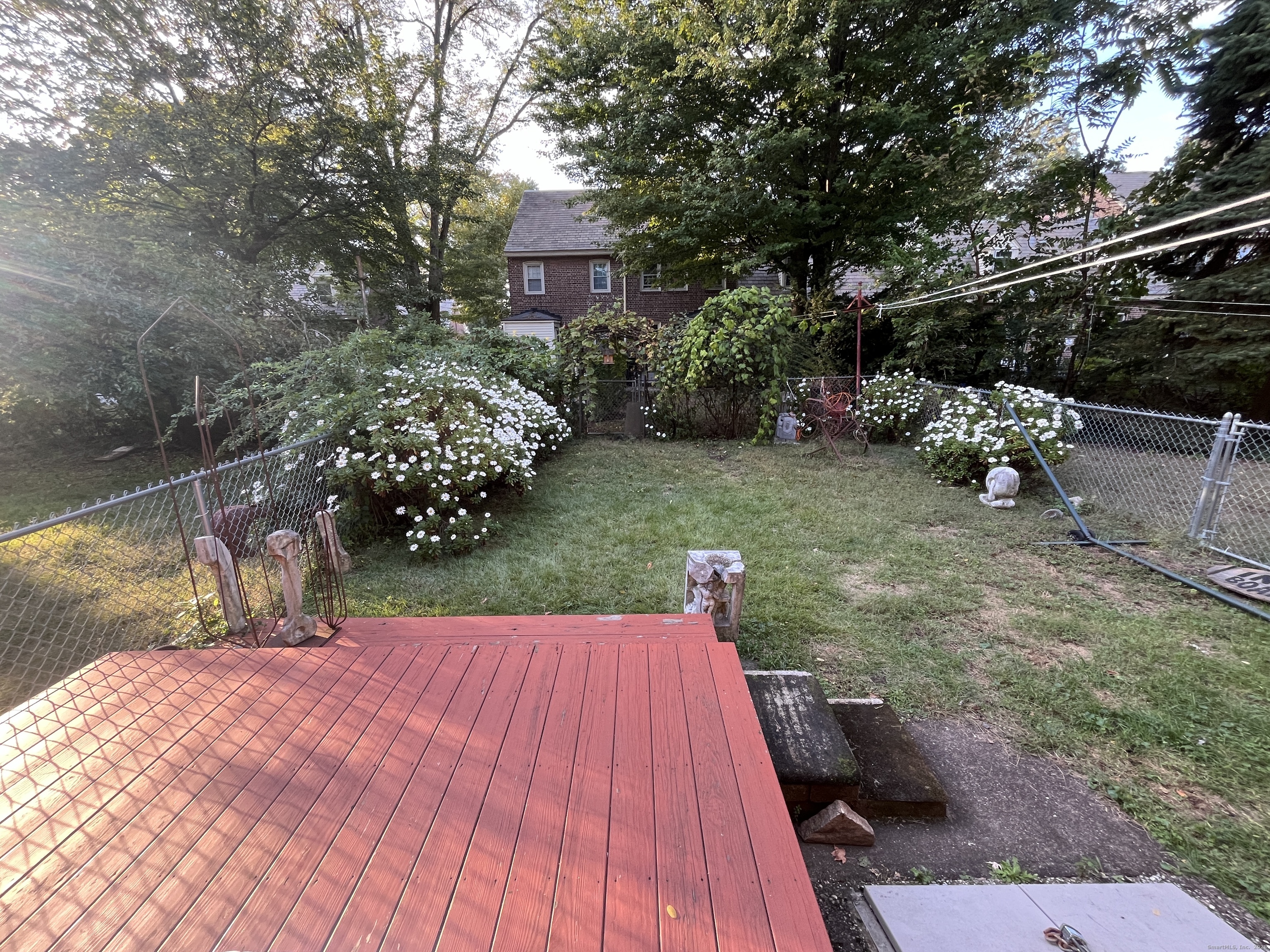68 Cole Street Bridgeport, CT 06604 - Photo 21 of 31 a view of a backyard with sitting area