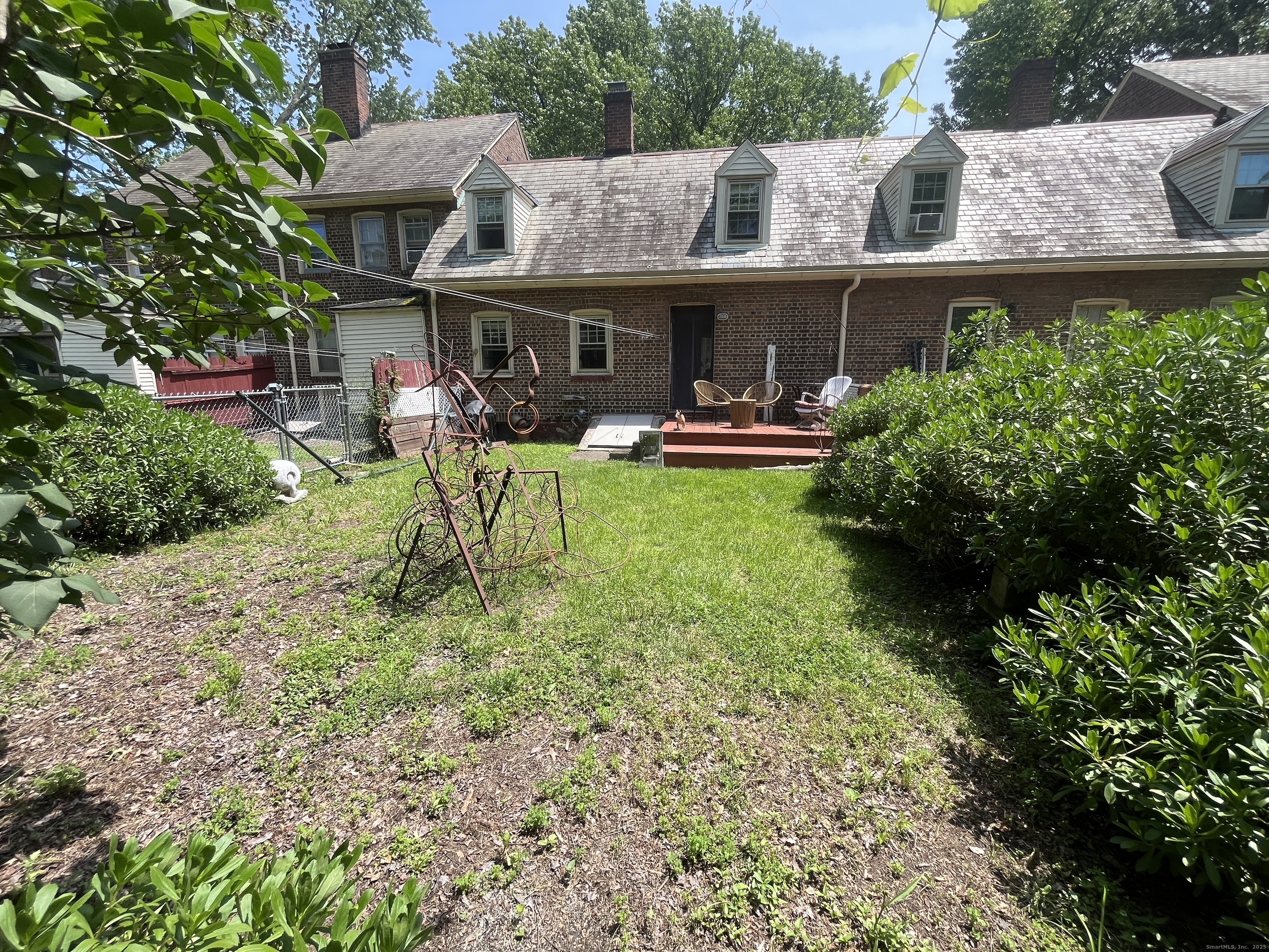 68 Cole Street Bridgeport, CT 06604 - Photo 22 of 31 a view of an house with backyard space and sitting area