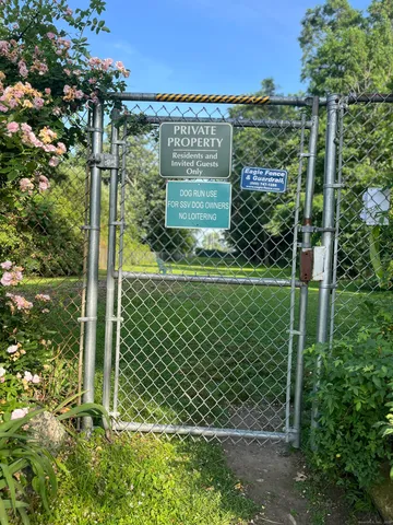 a view of a wooden fence