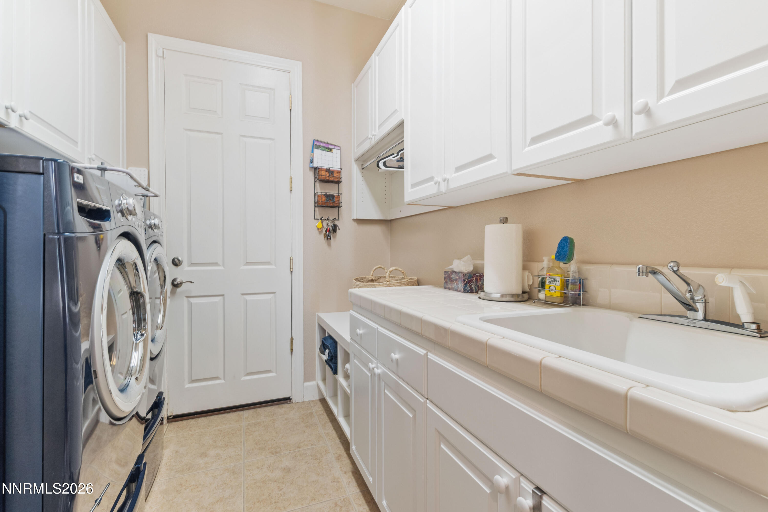 2395 Ridge Field Trail Reno, NV 89523 - Photo 18 of 44 a utility room with dryer and washer