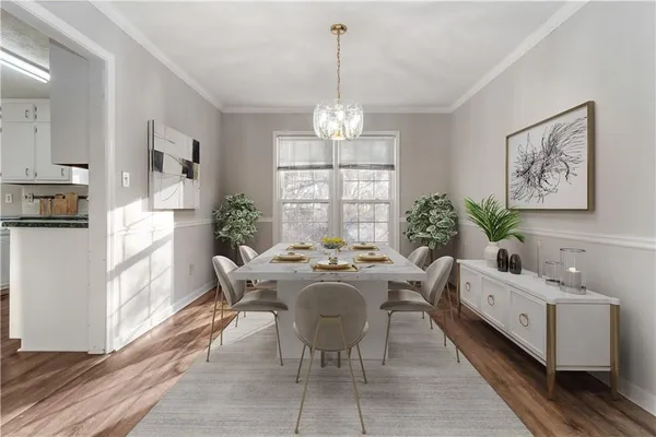 a view of a dining room with furniture window and wooden floor