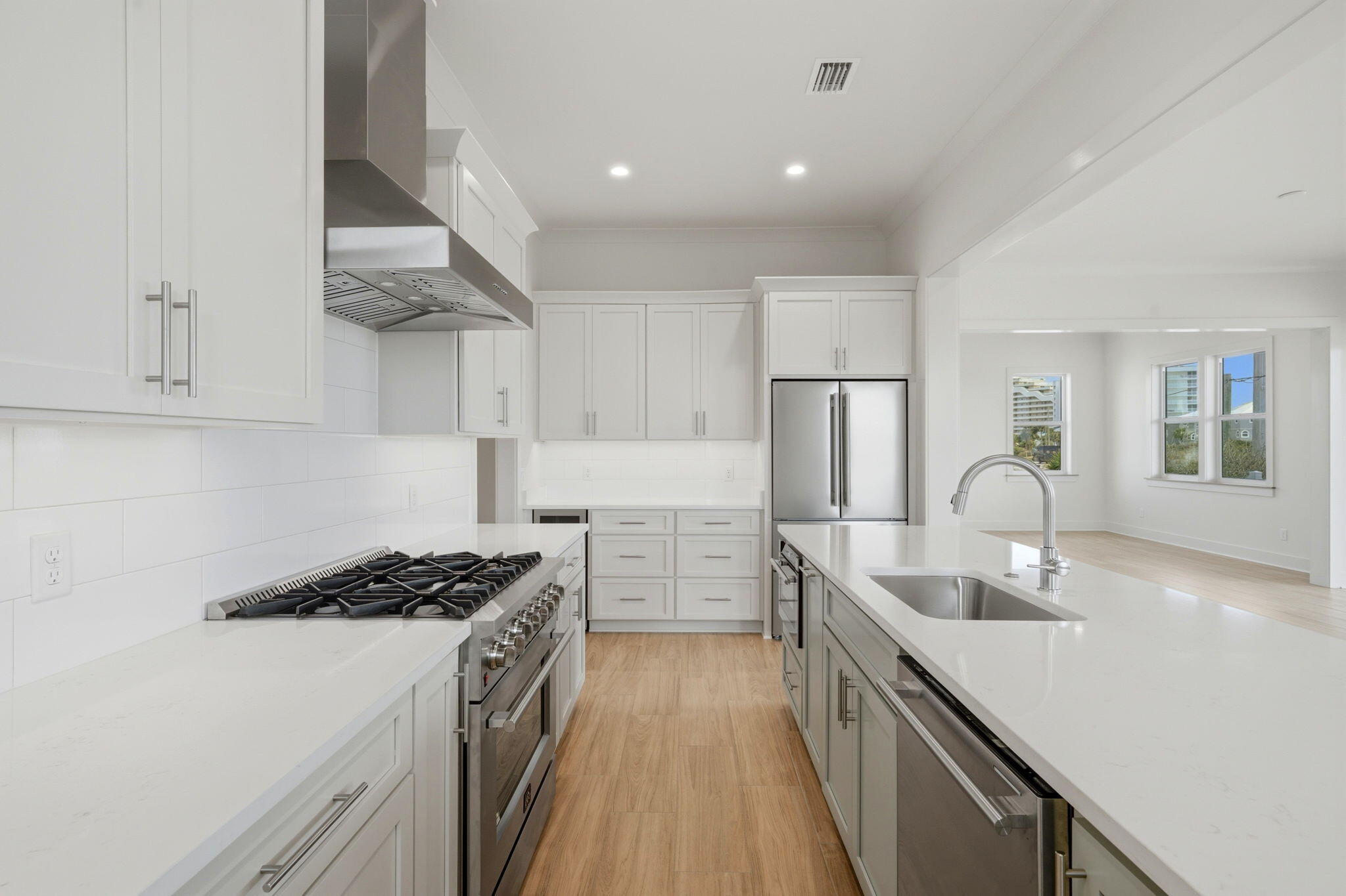 425 Gulfview Lane Perdido Key, FL 32507 - Photo 11 of 71 a kitchen with a sink stove and refrigerator