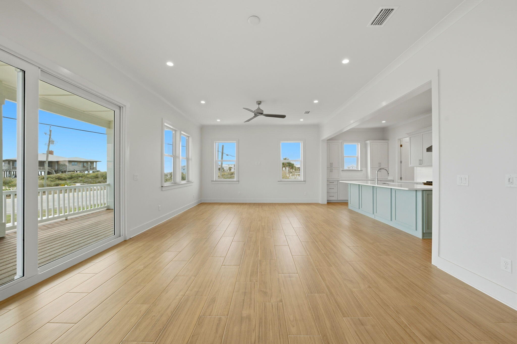 425 Gulfview Lane Perdido Key, FL 32507 - Photo 14 of 71 a view of empty room with wooden floor and fan