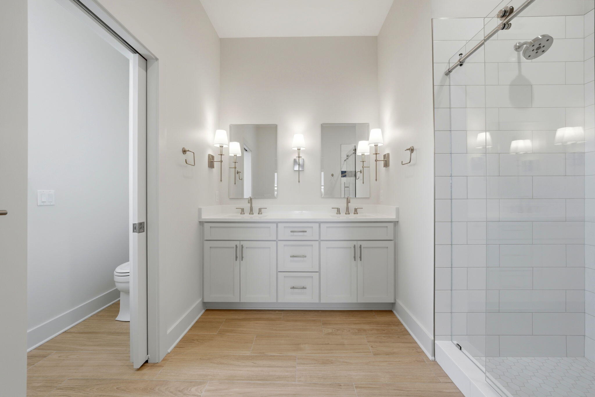425 Gulfview Lane Perdido Key, FL 32507 - Photo 21 of 71 a bathroom with a double vanity sink mirror and shower