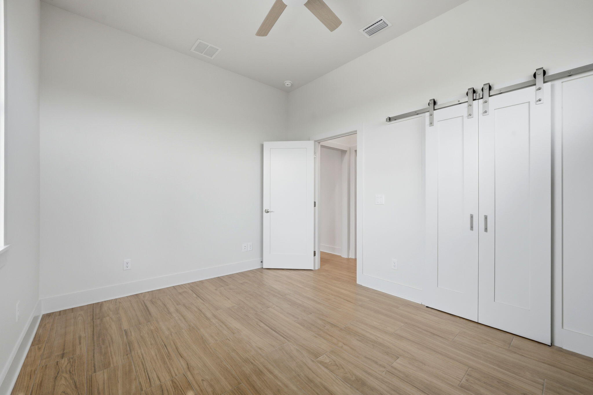425 Gulfview Lane Perdido Key, FL 32507 - Photo 24 of 71 wooden floor in an empty room