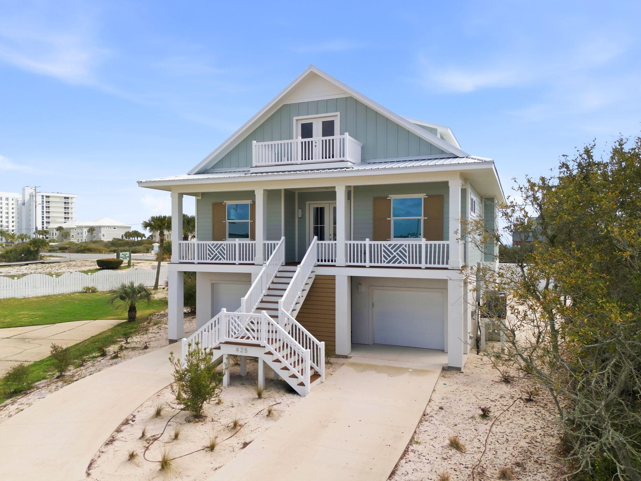 425 Gulfview Lane Perdido Key, FL 32507 - Photo 3 of 71 a front view of a house with a yard