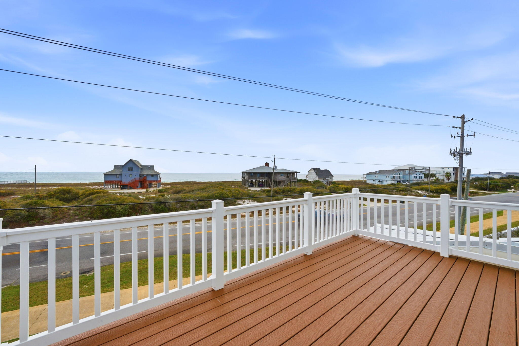 425 Gulfview Lane Perdido Key, FL 32507 - Photo 32 of 71 a view of a balcony with wooden floor