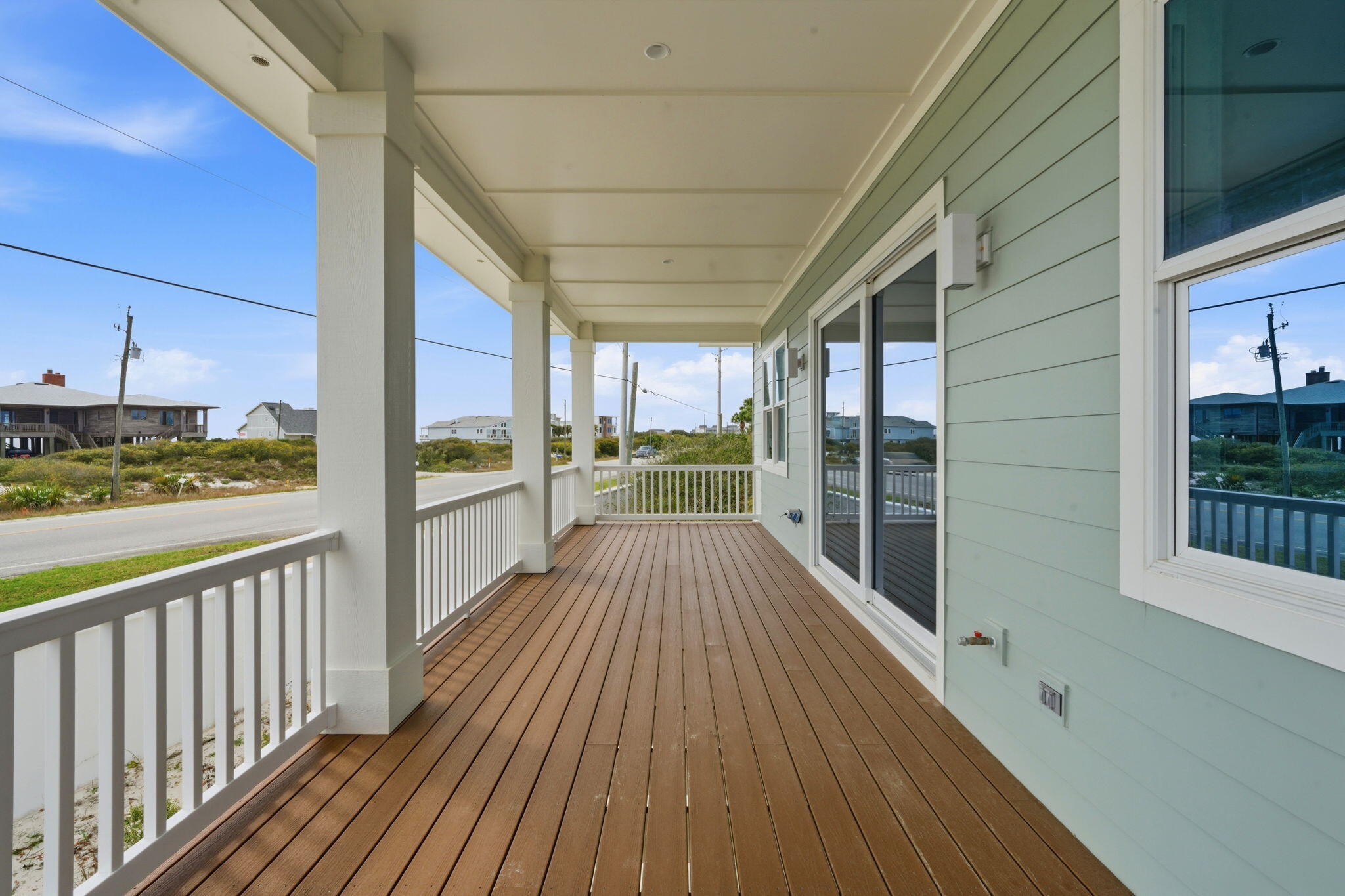 425 Gulfview Lane Perdido Key, FL 32507 - Photo 37 of 71 a view of a balcony with wooden floor