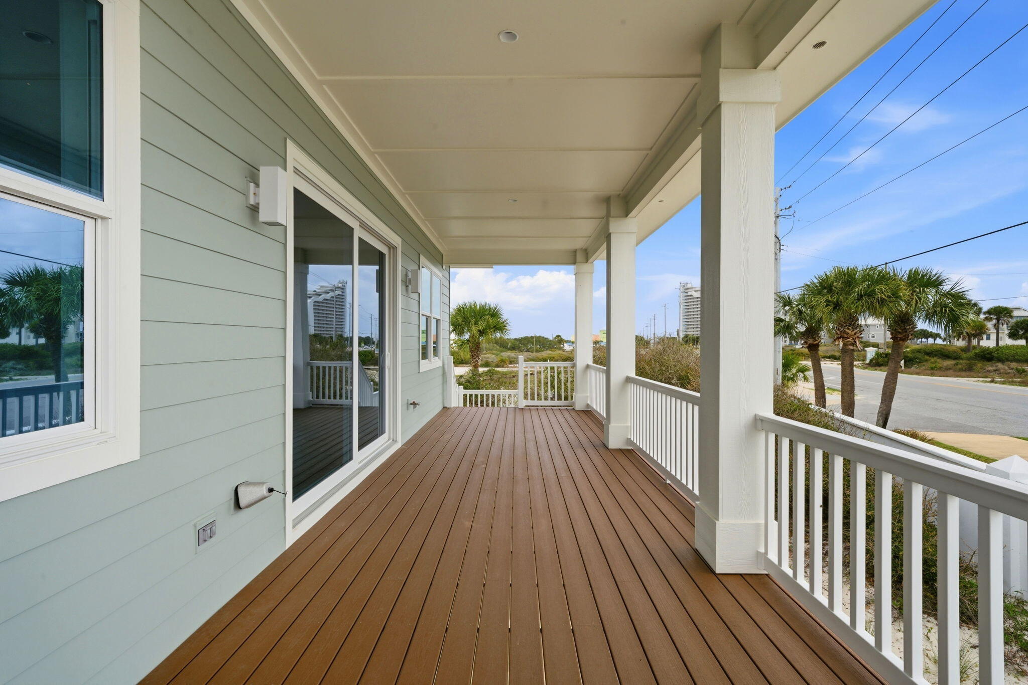 425 Gulfview Lane Perdido Key, FL 32507 - Photo 38 of 71 a view of a porch with wooden floor