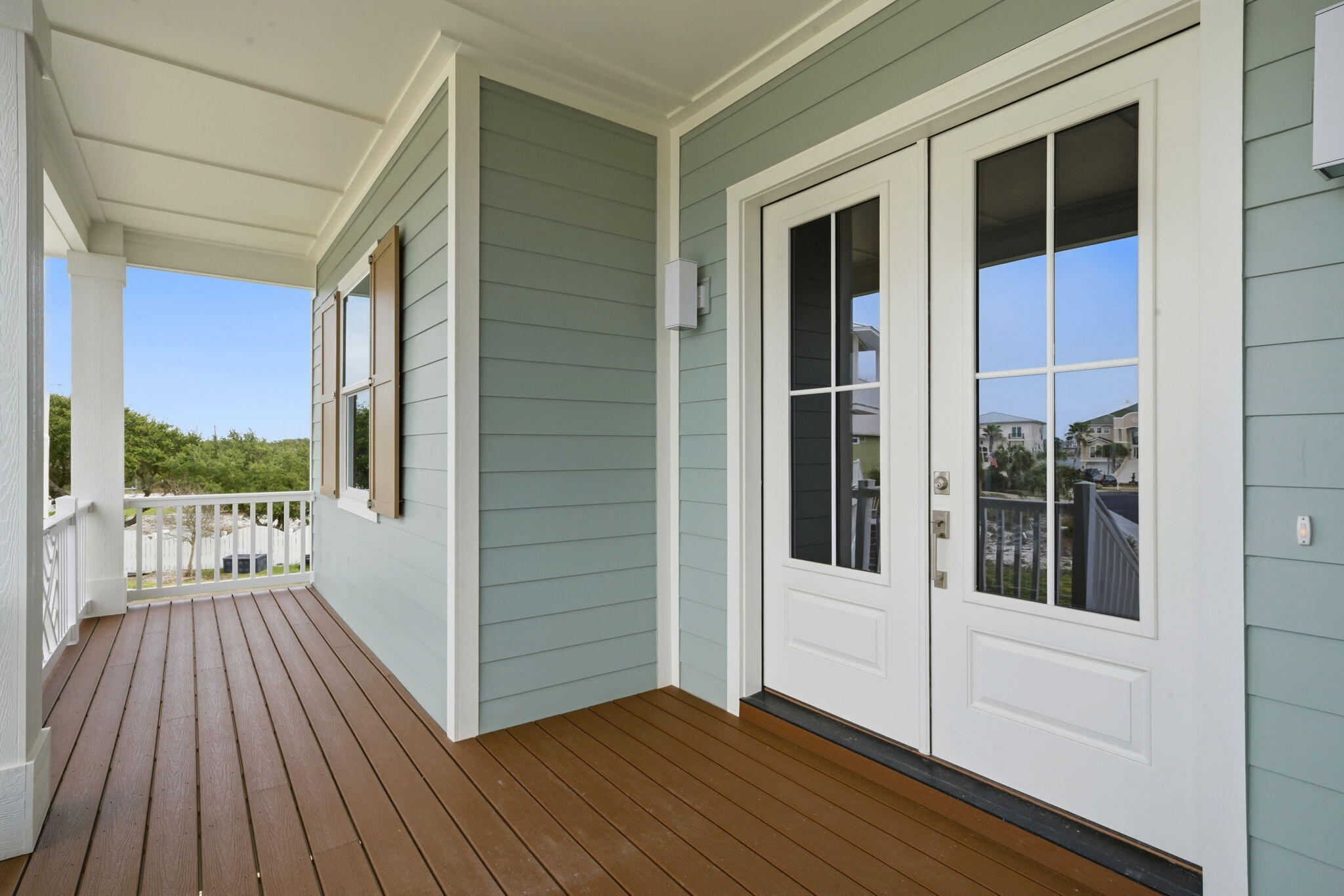 425 Gulfview Lane Perdido Key, FL 32507 - Photo 40 of 71 a view of a balcony with wooden floor and fence