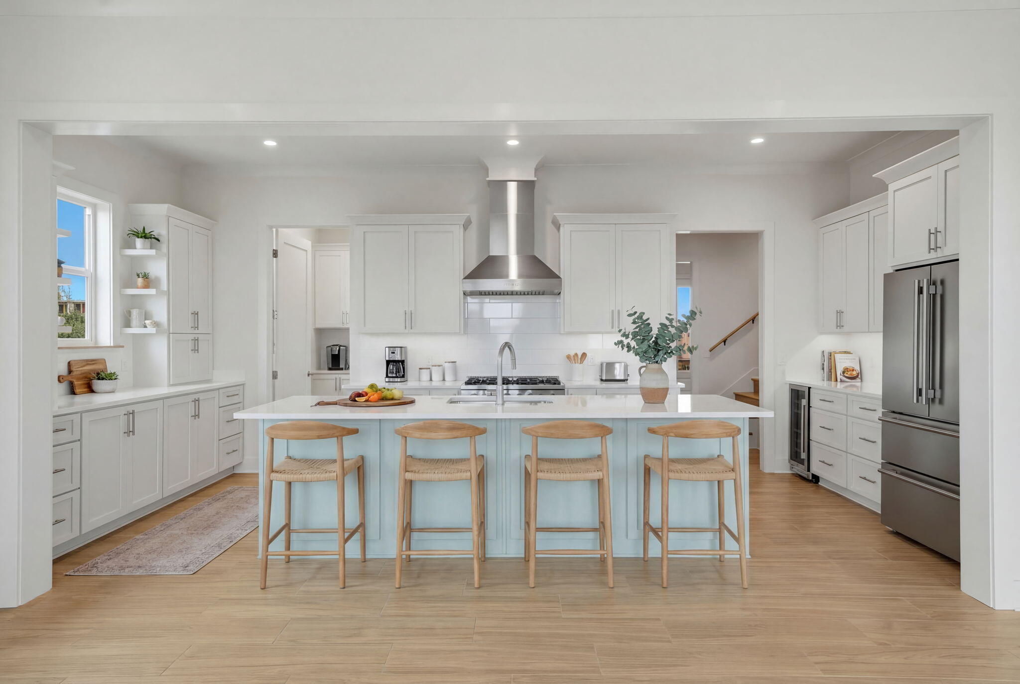 425 Gulfview Lane Perdido Key, FL 32507 - Photo 64 of 71 a kitchen with stainless steel appliances a dining table chairs and white cabinets