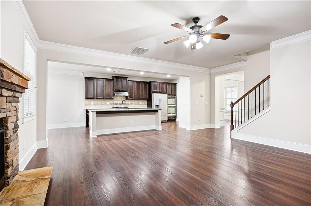 103 Gray Trail Acworth, GA 30101 - Photo 14 of 44 a view of kitchen with sink and wooden floor