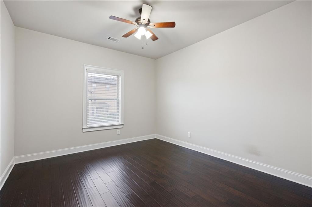 103 Gray Trail Acworth, GA 30101 - Photo 38 of 44 wooden floor in an empty room with a window