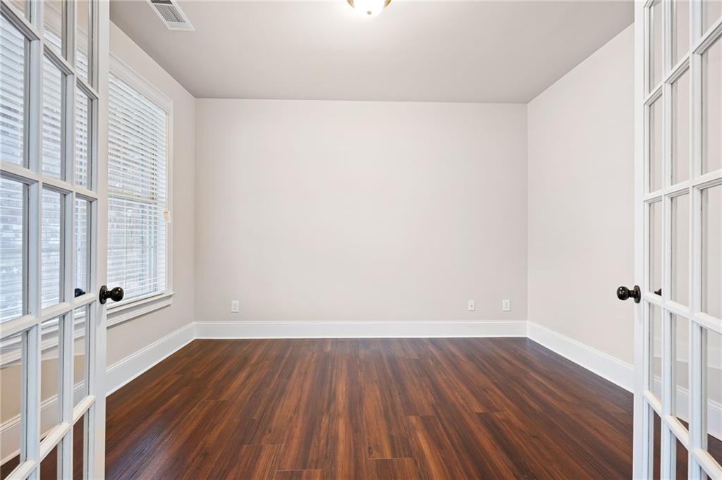 103 Gray Trail Acworth, GA 30101 - Photo 5 of 44 a view of room with wooden floor and window