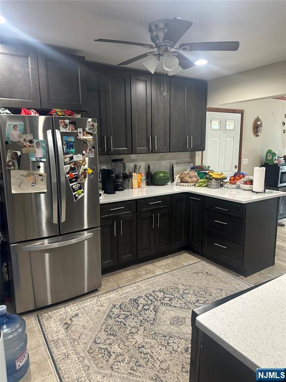 500 New Bridge Road Bergenfield, NJ 07621 - Photo 7 of 10 a kitchen with refrigerator and cabinets