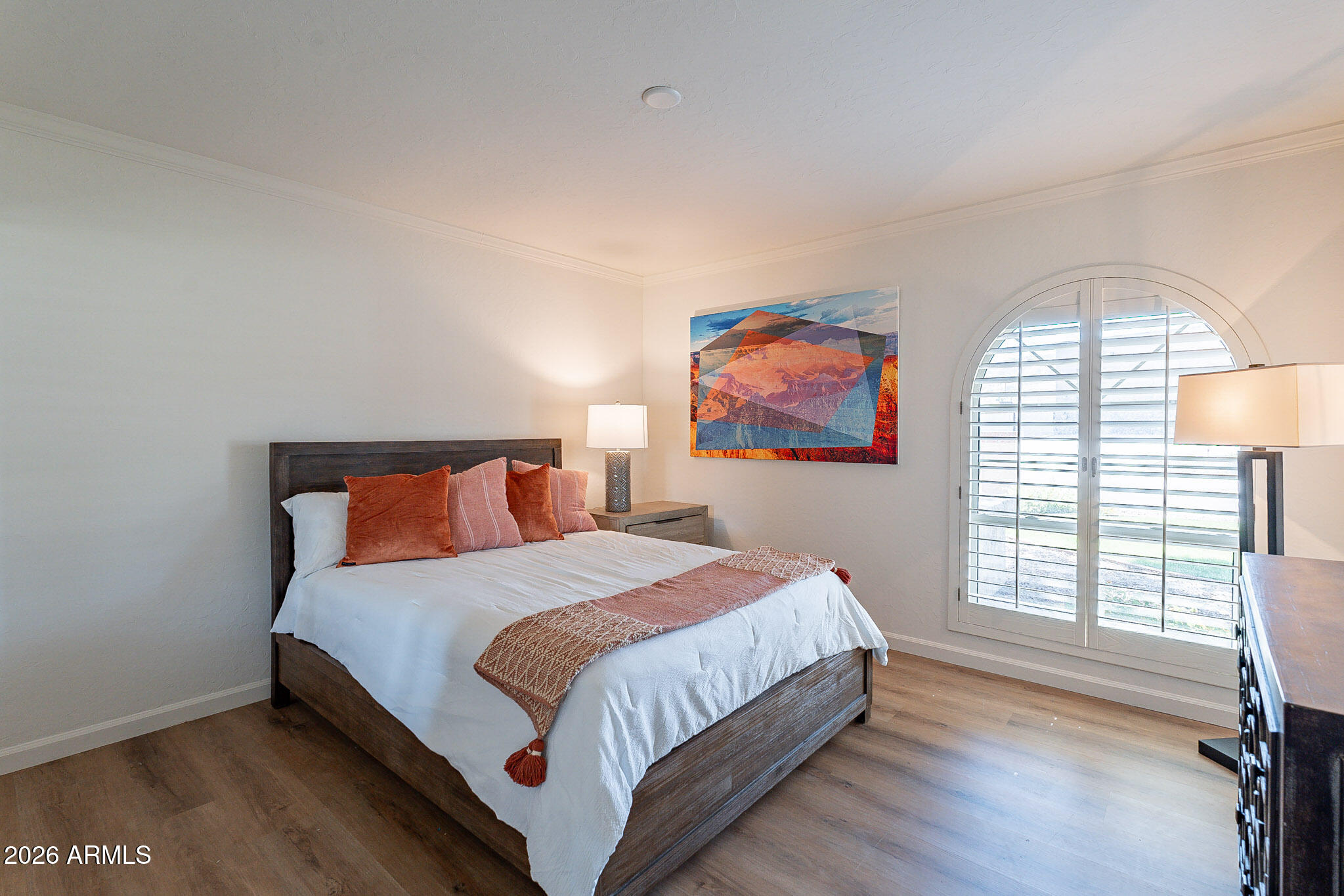 4226 East North Lane Phoenix, AZ 85028 - Photo 29 of 43 a bedroom with a bed and a large window