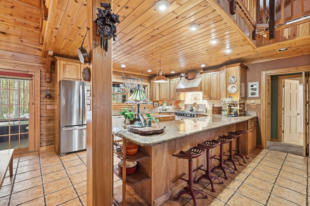 8 Ring Road Chesterfield, MA 01084 - Photo 12 of 42 a kitchen with stainless steel appliances granite countertop a sink and cabinets