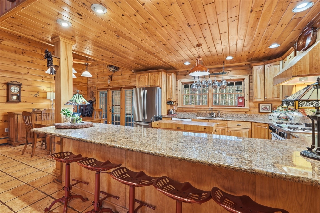 8 Ring Road Chesterfield, MA 01084 - Photo 13 of 42 a view of a kitchen with kitchen island granite countertop a large window and a counter space