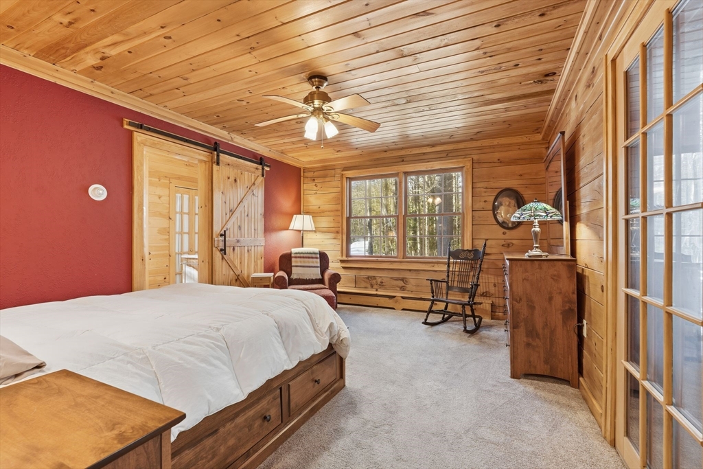 8 Ring Road Chesterfield, MA 01084 - Photo 19 of 42 a bedroom with a bed dresser and a window