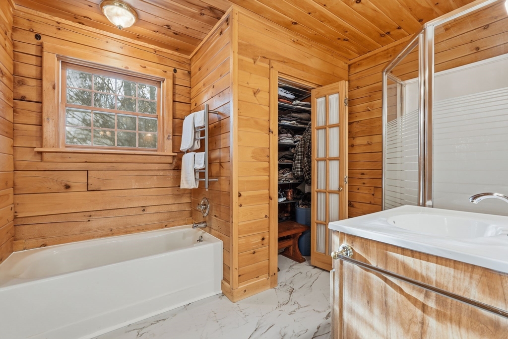 8 Ring Road Chesterfield, MA 01084 - Photo 24 of 42 a bathroom with a bathtub and a shower