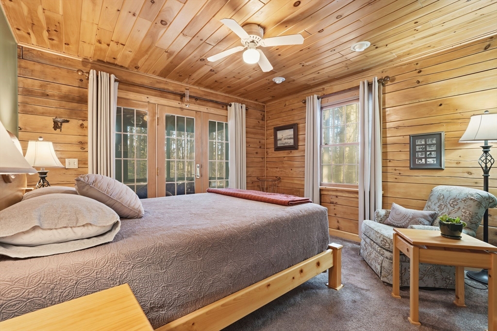 8 Ring Road Chesterfield, MA 01084 - Photo 25 of 42 a bedroom with a bed and wooden floor