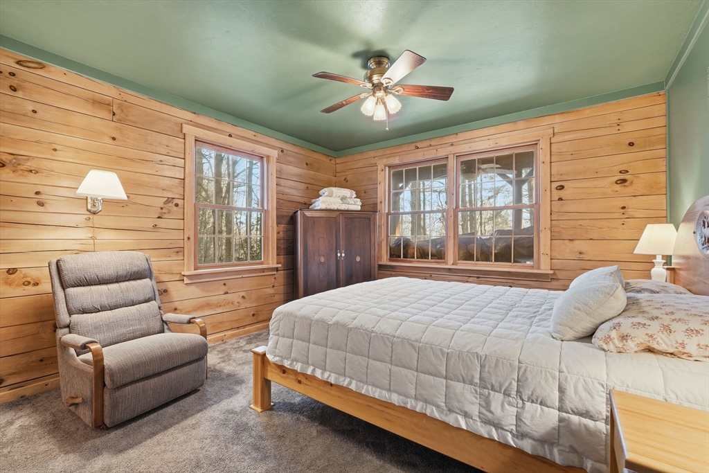 8 Ring Road Chesterfield, MA 01084 - Photo 26 of 42 a bedroom with a bed a couch and a large window with the outer view