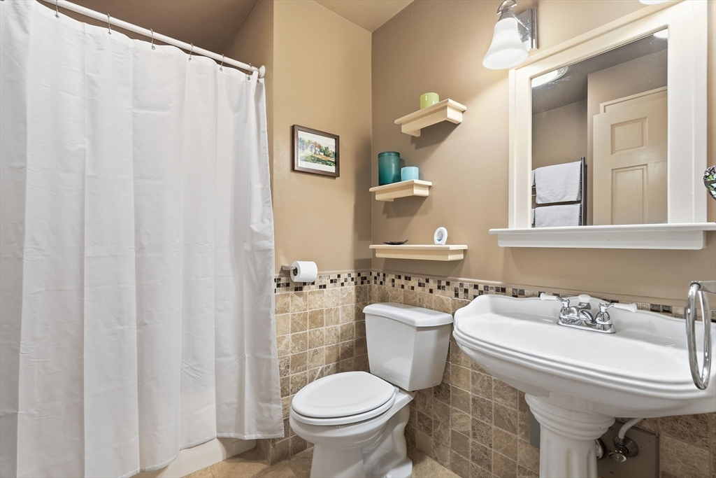 8 Ring Road Chesterfield, MA 01084 - Photo 28 of 42 a bathroom with a toilet sink and mirror