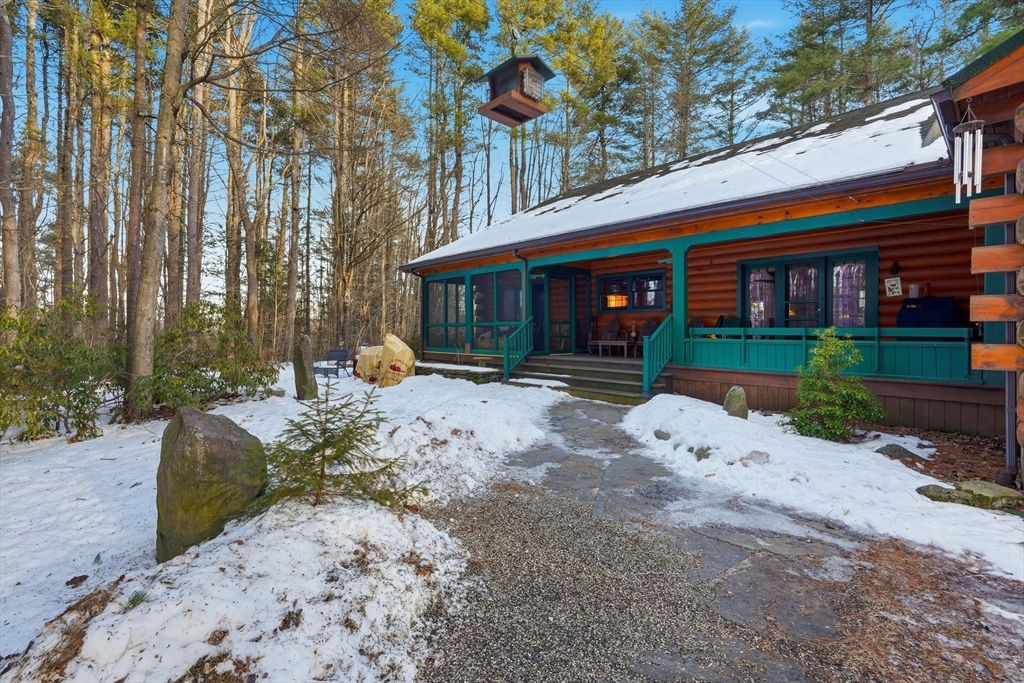 8 Ring Road Chesterfield, MA 01084 - Photo 32 of 42 a front view of a house with garden and trees