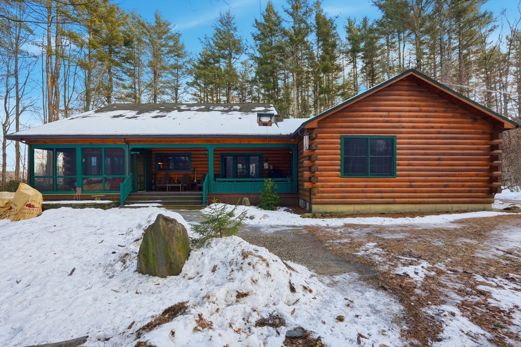 8 Ring Road Chesterfield, MA 01084 - Photo 34 of 42 a view of a house with a yard covered in snow