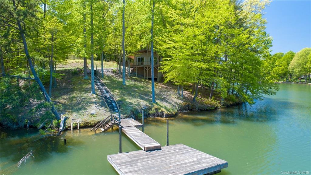 5138 Crystle Lake Road Denver, NC 28037 - Photo 18 of 41 a wooden deck with lake view