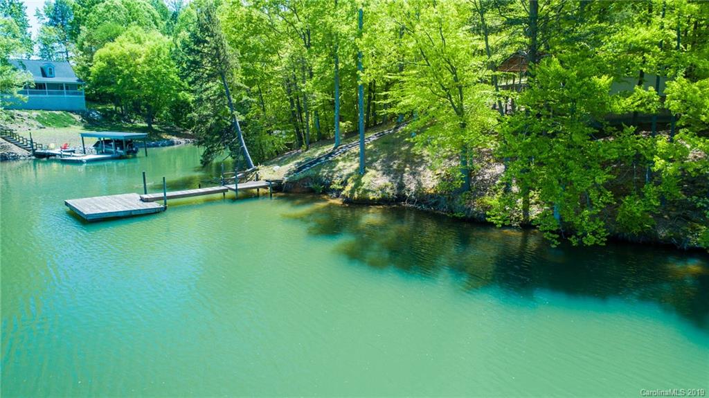 5138 Crystle Lake Road Denver, NC 28037 - Photo 20 of 41 a view of a lake with green space