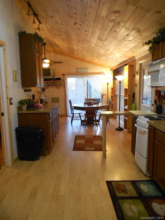5138 Crystle Lake Road Denver, NC 28037 - Photo 24 of 41 a living room with lots of furniture and kitchen view