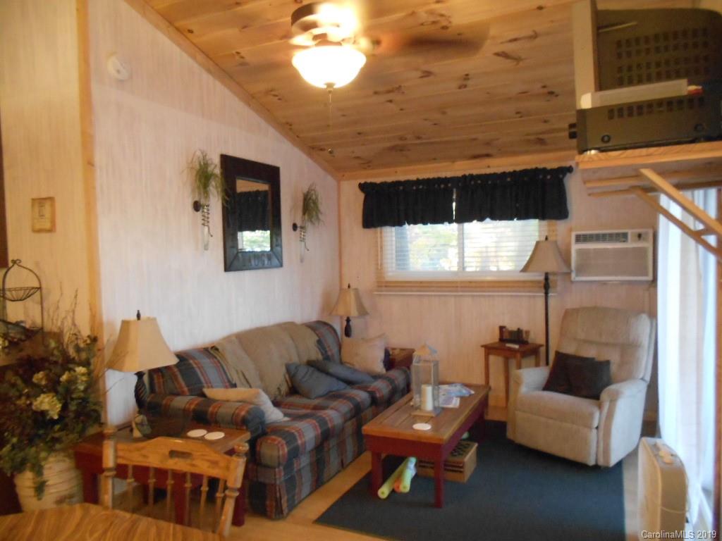 5138 Crystle Lake Road Denver, NC 28037 - Photo 27 of 41 a living room with furniture and a large window