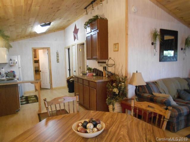 5138 Crystle Lake Road Denver, NC 28037 - Photo 28 of 41 a living room with furniture and wooden floor