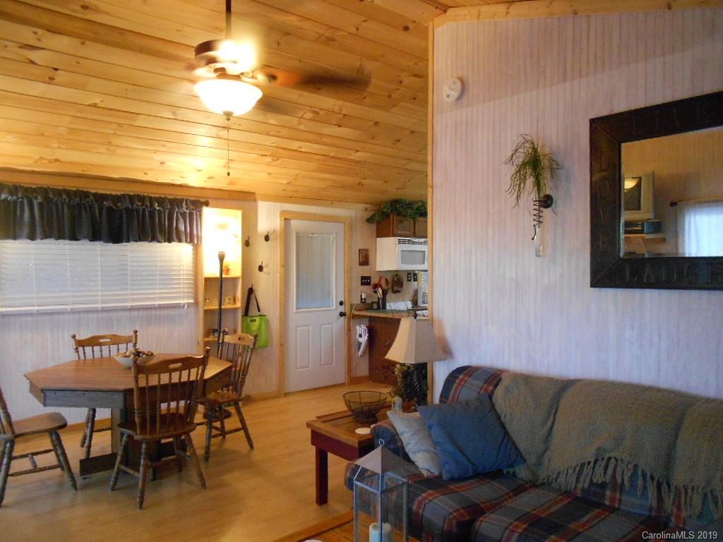 5138 Crystle Lake Road Denver, NC 28037 - Photo 29 of 41 a living room with furniture and a table