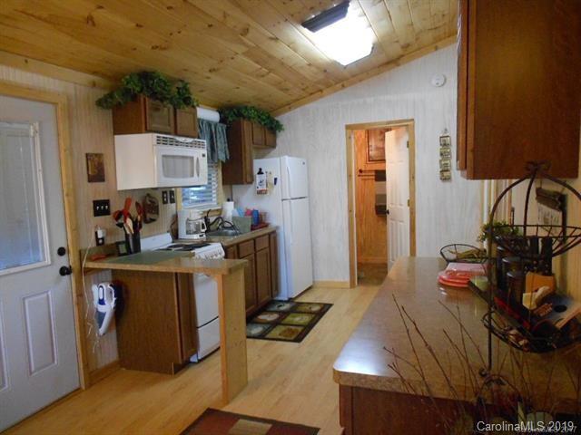 5138 Crystle Lake Road Denver, NC 28037 - Photo 31 of 41 a kitchen with a sink appliances and cabinets