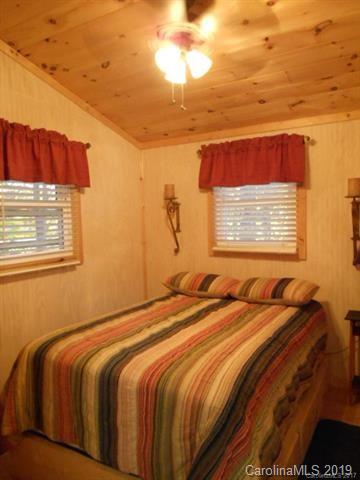 5138 Crystle Lake Road Denver, NC 28037 - Photo 32 of 41 a bedroom with a bed and a window
