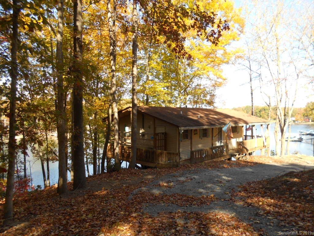5138 Crystle Lake Road Denver, NC 28037 - Photo 38 of 41 a view of a large house with a tree