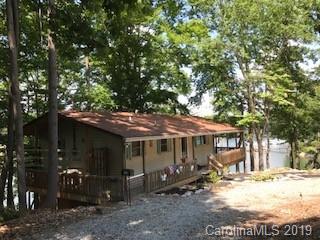 5138 Crystle Lake Road Denver, NC 28037 - Photo 7 of 41 a front view of a house with a garden