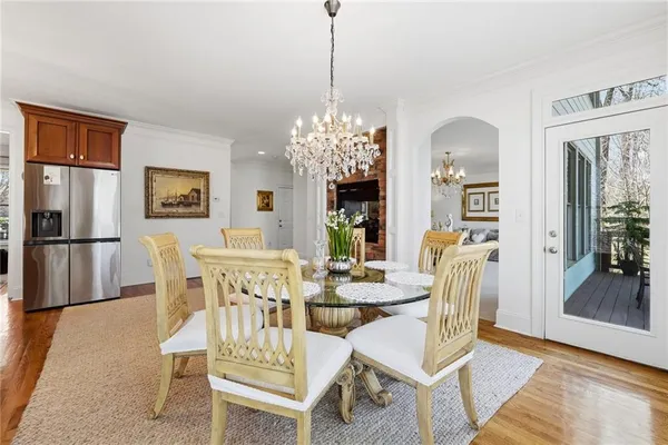 a kitchen with stainless steel appliances granite countertop a sink and stove