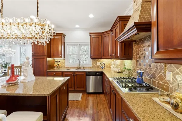 a spacious bathroom with a tub sink shower and mirror