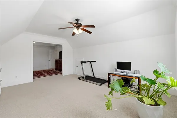 a bed room with a bed and a window