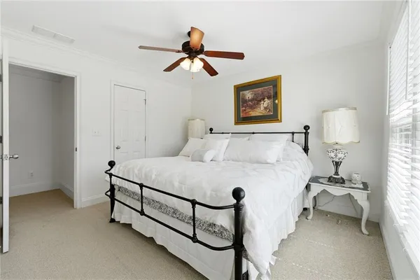 a kitchen with a sink a counter space cabinets and appliances