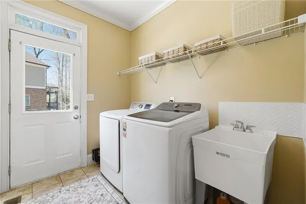 an aerial view of a house with outdoor space