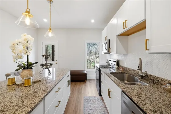 an aerial view of residential house with outdoor space
