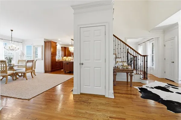 a view of entryway with wooden floor