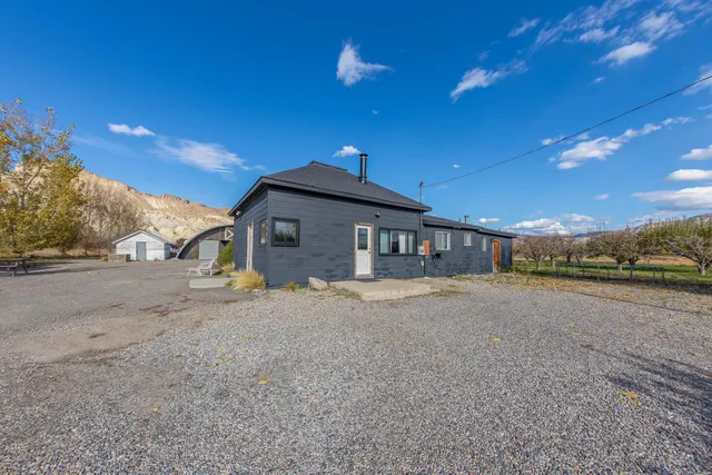 a kitchen with stainless steel appliances granite countertop a stove and cabinets