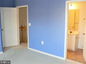 538 Rhapsody Court, Unit 538 Cockeysville, MD 21030 - Photo 23 of 30 Bright blue walls invite creativity.
